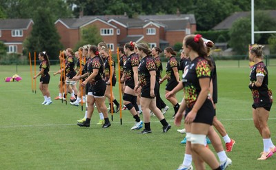 180825 - Wales Women Training Session - The players warm up during a Wales Women training session ahead of their first Women’s Rugby World Cup match against Scotland