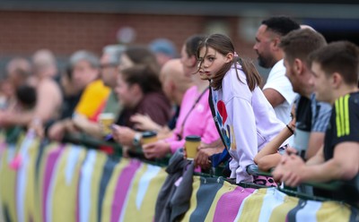 180825 - Wales Women Training Session - Rugby supporters watch during a Wales Women training session ahead of their first Women’s Rugby World Cup match against Scotland