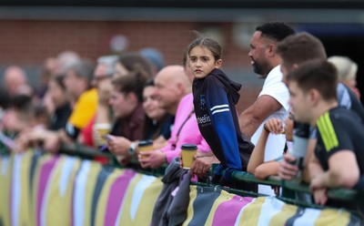 180825 - Wales Women Training Session - Rugby supporters watch during a Wales Women training session ahead of their first Women’s Rugby World Cup match against Scotland