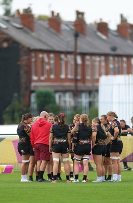 180825 - Wales Women Training Session - The team huddle up during a Wales Women training session ahead of their first Women’s Rugby World Cup match against Scotland