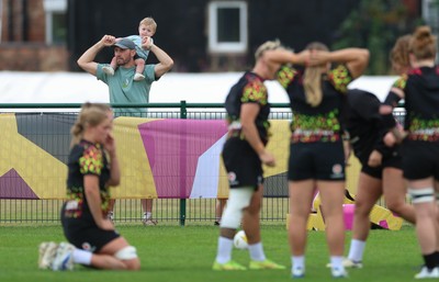 180825 - Wales Women Training Session - A young rugby supporter looks on during a Wales Women training session ahead of their first Women’s Rugby World Cup match against Scotland