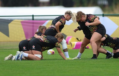 180825 - Wales Women Training Session - The team scrum down during a Wales Women training session ahead of their first Women’s Rugby World Cup match against Scotland