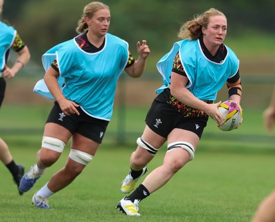 180825 - Wales Women Training Session - Abbie Fleming with Tilly Vucaj during a Wales Women training session ahead of their first Women’s Rugby World Cup match against Scotland
