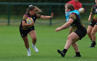 180825 - Wales Women Training Session - Kayleigh Powell takes on Maisie Davies during a Wales Women training session ahead of their first Women’s Rugby World Cup match against Scotland