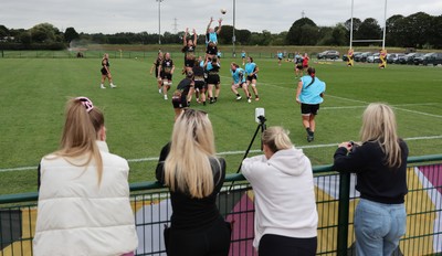 180825 - Wales Women Training Session - Rugby fans watch the team during a Wales Women training session ahead of their first Women’s Rugby World Cup match against Scotland