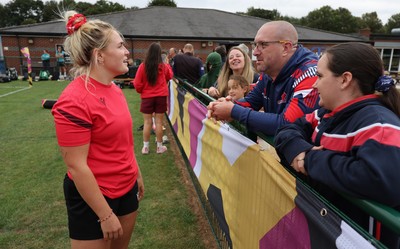 180825 - Wales Women Training Session - Wales’  Alex Callendar with rugby fans who watched the Wales Women training session ahead of their first Women’s Rugby World Cup match against Scotland