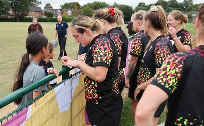 180825 - Wales Women Training Session - Wales’  Courtney Keight with rugby fans who watched the Wales Women training session ahead of their first Women’s Rugby World Cup match against Scotland