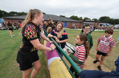 180825 - Wales Women Training Session - Wales’  Alaw Pyrs with rugby fans who watched the Wales Women training session ahead of their first Women’s Rugby World Cup match against Scotland