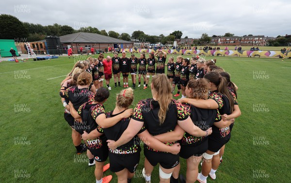 180825 - Wales Women Training Session - The team huddle up during a Wales Women training session ahead of their first Women’s Rugby World Cup match against Scotland