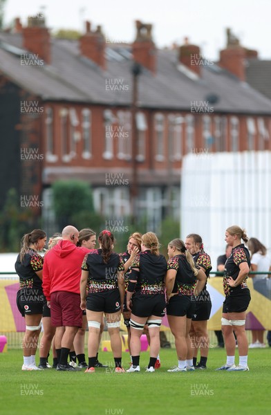 180825 - Wales Women Training Session - The team huddle up during a Wales Women training session ahead of their first Women’s Rugby World Cup match against Scotland