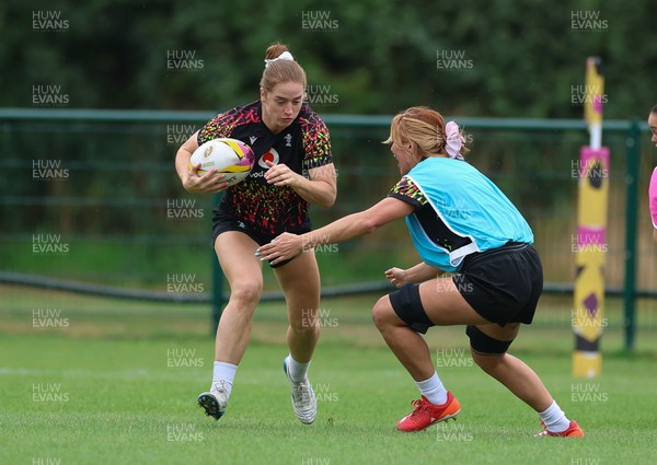 180825 - Wales Women Training Session - Lisa Neumann takes on Georgia Evans during a Wales Women training session ahead of their first Women’s Rugby World Cup match against Scotland