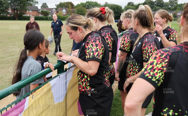 180825 - Wales Women Training Session - Wales’  Courtney Keight with rugby fans who watched the Wales Women training session ahead of their first Women’s Rugby World Cup match against Scotland
