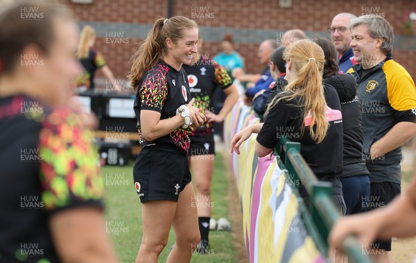 180825 - Wales Women Training Session - Lisa Neumann talks with rugby fans during a Wales Women training session ahead of their first Women’s Rugby World Cup match against Scotland