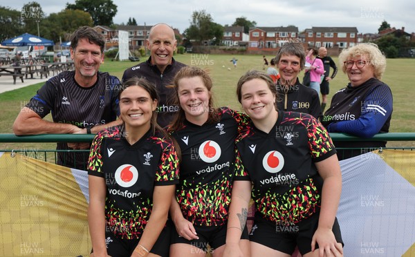 180825 - Wales Women Training Session - Wales’  Bryonie King, Kate Williams and Maisie Davies with rugby fans who watched the Wales Women training session ahead of their first Women’s Rugby World Cup match against Scotland