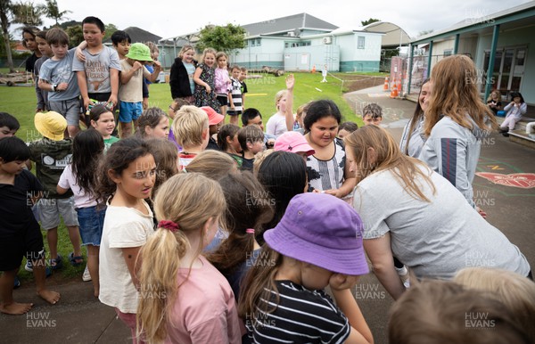 281022 - Wales Women Rugby School Engagement Event at Kamo Primary School - Wales team member Caryl Thomas meets pupils at Kamo Primary School in Whangarei during a visit to take part in rugby activities