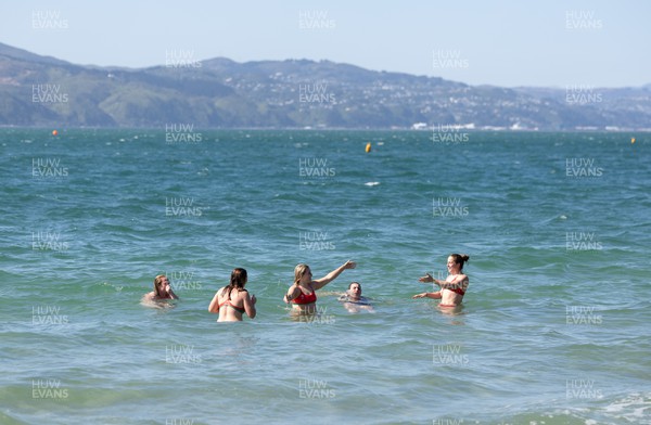 191023 - Wales Women Rugby Sea Recovery - Wales Women rugby players take a sea recovery session in Oriental Bay, Wellington after training ahead of Wales’ opening match of WXV1 against Canada Left to right, Abbie Fleming, Kate Williams, Alex Callender, Gwenllian Pyrs and Lisa Neumann