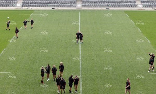 261023 - Wales’ Women Stadium Orientation and Kickers Session - The Wales team gather for a stadium orientation session at the Forsyth Barr Stadium in Dunedin where they will play New Zealand in WCV1 on Saturday