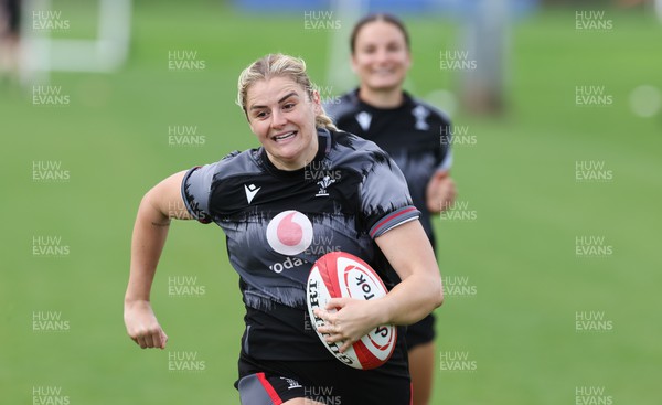 010923 - Wales Women Rugby training session - Carys Williams-Morris gets away from Jazz Joyce during a training session in the build up to the WXV matches in New Zealand