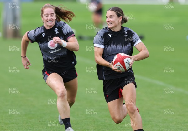010923 - Wales Women Rugby training session - Jazz Joyce gets away from Lisa Neumann during a training session in the build up to the WXV matches in New Zealand
