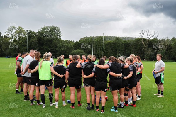 010923 - Wales Women Rugby training session - The Wales Women squad huddle together during a training session in the build up to the WXV matches in New Zealand