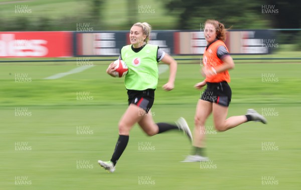 010923 - Wales Women Rugby training session - Hannah Jones supported by Lisa Neumann during a training session in the build up to the WXV matches in New Zealand