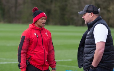 010421 - Wales Women Rugby Squad Training session - Wales Women's head coach Warren Abrahams, left, chats with with Wales mens head coach Wayne Pivac after the women's training session ahead of the start of the Women's Six Nations