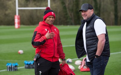 010421 - Wales Women Rugby Squad Training session - Wales Women's head coach Warren Abrahams, left, chats with with Wales mens head coach Wayne Pivac after the women's training session ahead of the start of the Women's Six Nations