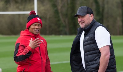 010421 - Wales Women Rugby Squad Training session - Wales Women's head coach Warren Abrahams, left, chats with with Wales mens head coach Wayne Pivac after the women's training session ahead of the start of the Women's Six Nations