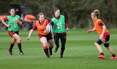 010421 - Wales Women Rugby Squad Training session - Left to right, Jess Roberts, Gwenllian Jenkins, Robyn Wilkins and Bethan Dainton of Wales during training session ahead of the start of the Women's Six Nations