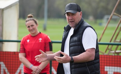 010421 - Wales Women Rugby Squad Training session - Wales Women's head coach Warren Abrahams, left, chats with with Wales mens head coach Wayne Pivac after the women's training session ahead of the start of the Women's Six Nations