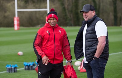 010421 - Wales Women Rugby Squad Training session - Wales Women's head coach Warren Abrahams, left, chats with with Wales mens head coach Wayne Pivac after the women's training session ahead of the start of the Women's Six Nations