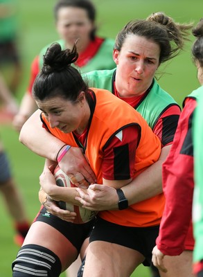 010421 - Wales Women Rugby Squad Training session - Jess Roberts of Wales is tackled by Siwan Lillicrap of Wales during training session ahead of the start of the Women's Six Nations