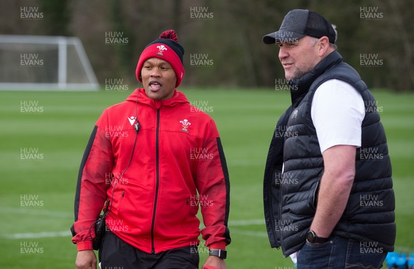 010421 - Wales Women Rugby Squad Training session - Wales Women's head coach Warren Abrahams, left, chats with with Wales mens head coach Wayne Pivac after the women's training session ahead of the start of the Women's Six Nations