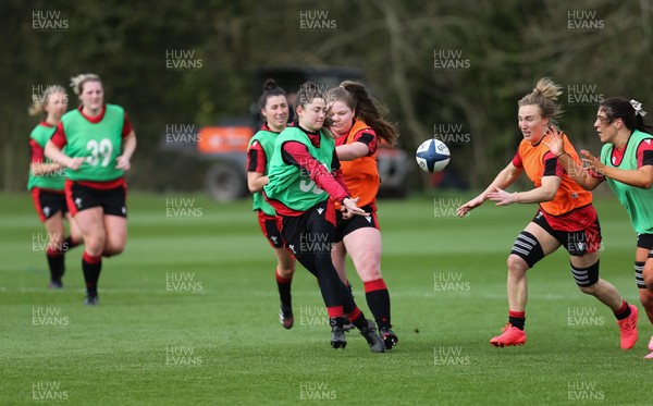 010421 - Wales Women Rugby Squad Training session - Left to right, Jess Roberts, Gwenllian Jenkins, Robyn Wilkins and Bethan Dainton of Wales during training session ahead of the start of the Women's Six Nations