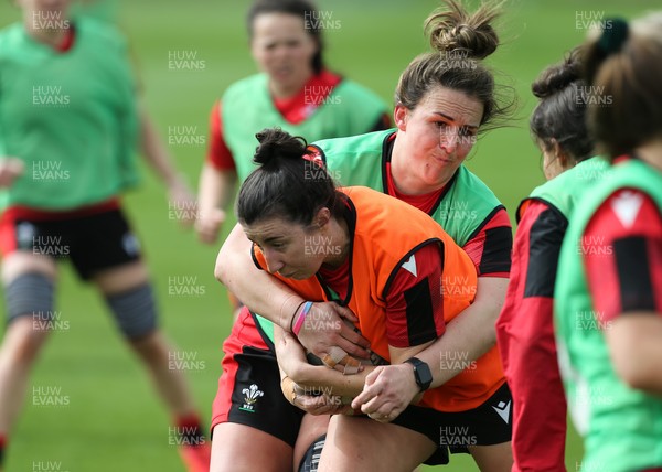 010421 - Wales Women Rugby Squad Training session - Jess Roberts of Wales is tackled by Siwan Lillicrap of Wales during training session ahead of the start of the Women's Six Nations