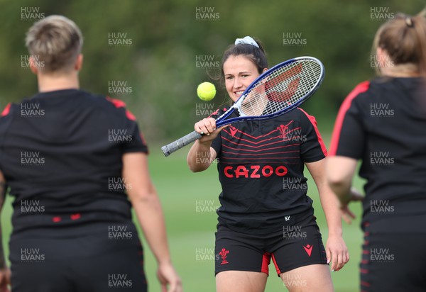 210922 - Wales Women RWC Training Session - Kayleigh Powell turns tennis pro during a training session ahead of departure to New Zealand for the Rugby World Cup