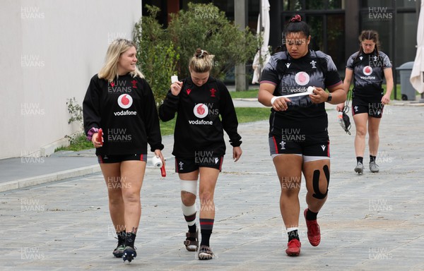 250423 - Wales Women Rugby Training Session - Alex Callender, Keira Bevan and Sisilia Tuipulotu arrive at Parma Rugby Club for a training session ahead of the TicTok Women’s 6 Nations match against Italy