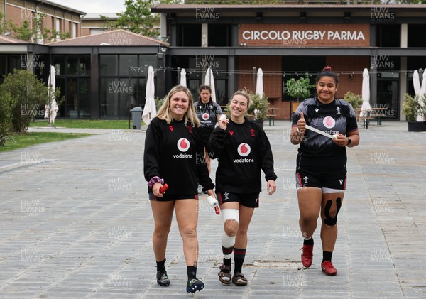 250423 - Wales Women Rugby Training Session - Alex Callender, Keira Bevan and Sisilia Tuipulotu arrive at Parma Rugby Club for a training session ahead of the TicTok Women’s 6 Nations match against Italy
