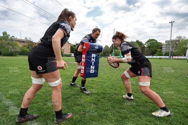 250423 - Wales Women Rugby Training Session - Bryonie King, left, Charlie Munday, centre and Kate Williams during a training session at Parma Rugby Club ahead of the TicTok Women’s 6 Nations match against Italy