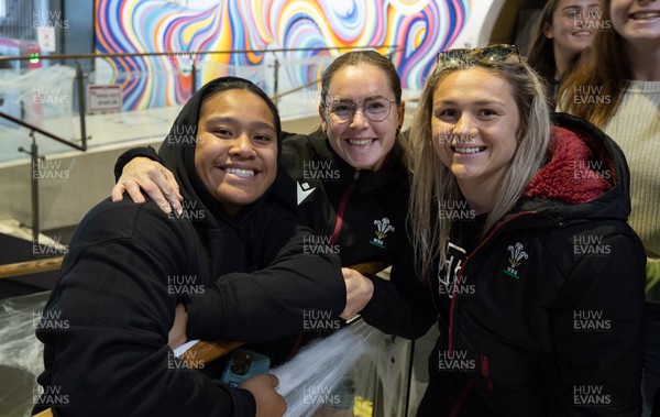 131023 - Members of the Wales Women squad take the Wellington Tram to the overlook the city as they get some down time after their first training session in New Zealand Left to right, Sisilia Tuipulotu, Kat Evans and Hannah Bluck
