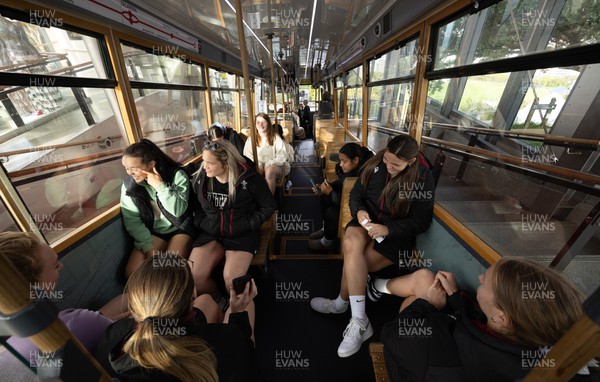 131023 - Wales squad members Megan Davies, Hannah Bluck and Bryonie King take the Wellington Tram to the overlook the city as they get some down time after their first training session in New Zealand 