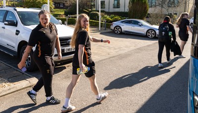 200325  Wales Women Rugby Squad travel to Edinburgh - Maisie Davies and Catherine Richards make their way to the bus as Wales head to Edinburgh for the opening match of the Women’s 6 Nations against Scotland