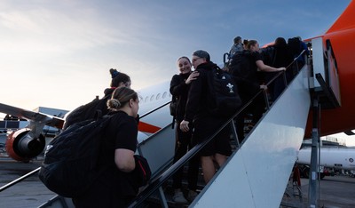 200325  Wales Women Rugby Squad travel to Edinburgh - Jasmine Joyce and Donna Rose board the flight at Bristol Airport as Wales head to Edinburgh for the opening match of the Women’s 6 Nations against Scotland