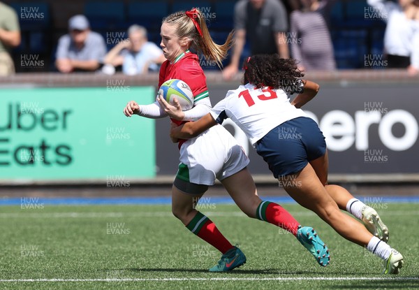 270724 - Wales Women U18 v USA Women U18 - Megan Thomas of Wales takes on Marley Larkin of USA