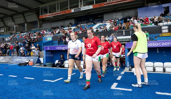 270724 - Wales Women U18 v USA Women U18 - Wales players run out at the start of the match