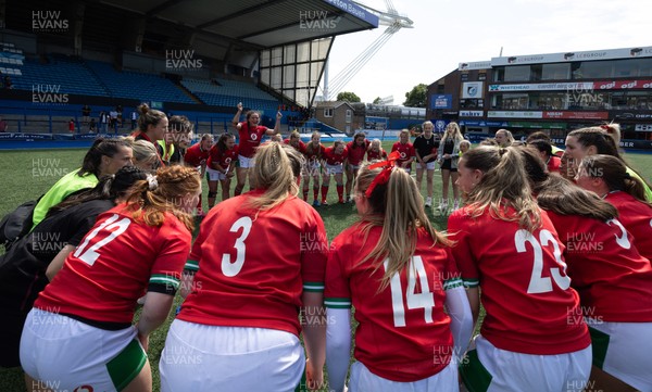 270724 - Wales Women U18 v USA Women U18 - The Wales team huddle together at the end of the match