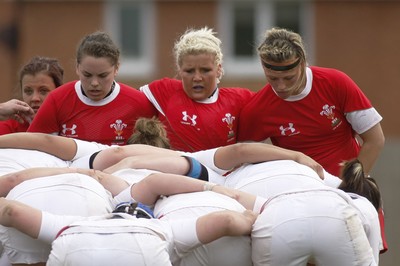 09.05.10 Wales v England - Womens' Under 20's - Wales' (L-R) Lowri Harris, Amy Lawrence  & Alex Stokes prepare to scrummage. 