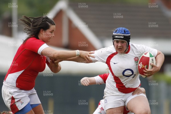 09.05.10 Wales v England - Womens' Under 20's - England's Nicola Hoole tris to hand off Wales' Vicky Owen. 