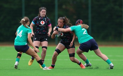 050725  Wales Women U20 v Ireland Women U20, Women’s U20 Six Nations Summer Series - Branwen Metcalfe of Wales is tackled by Beth Buttimer of Ireland