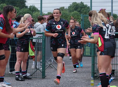 050725  Wales Women U20 v Ireland Women U20, Women’s U20 Six Nations Summer Series - Branwen Metcalfe of Wales leads the team out for the start of the match